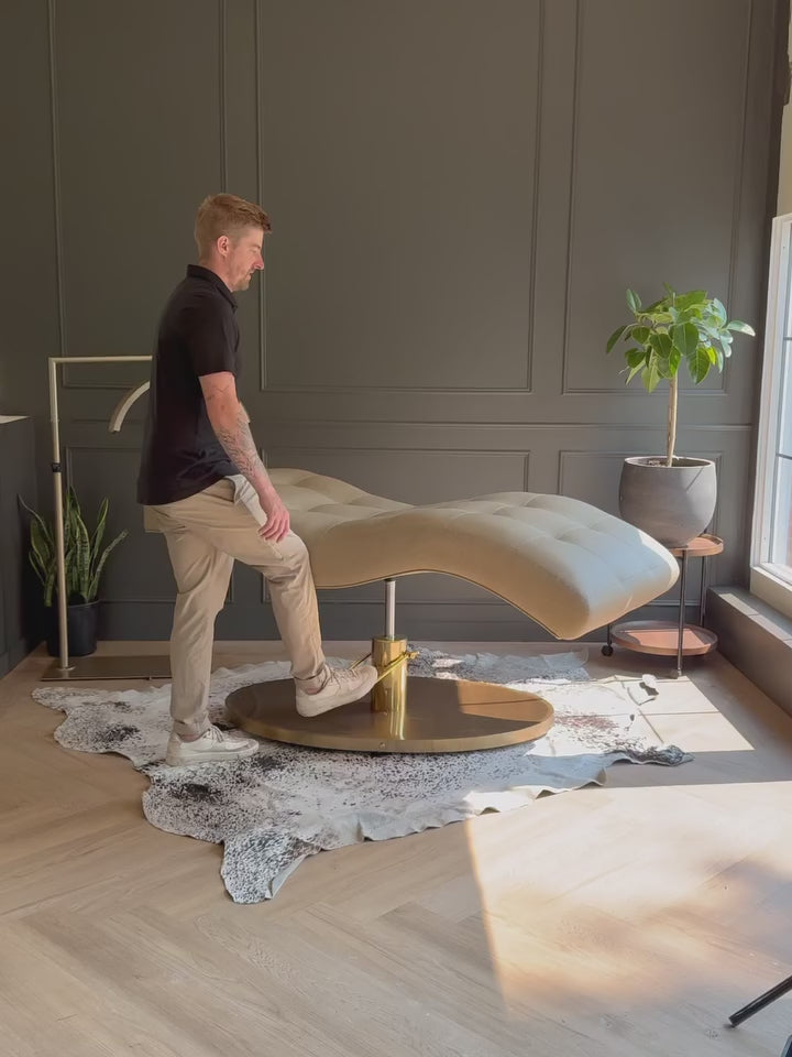 Load video: <p>360 degree rotation, famous anti-gravity curves, and full height adjustability. Pillowy box channelled flutes adorn the body for an ultra comfortable appointment.</p>